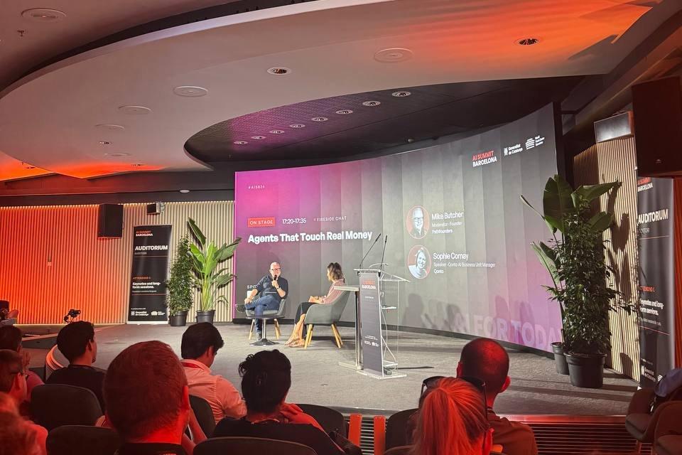 Fireside chat on the AI Summit Barcelona auditorium stage titled “Agents That Touch Real Money”